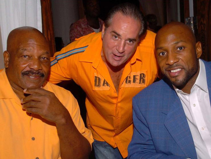 Tommy with Jim Brown and Alonzo Mourning